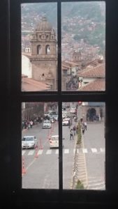 Plaza De Armas through the window of Paddy's Irish Bar.